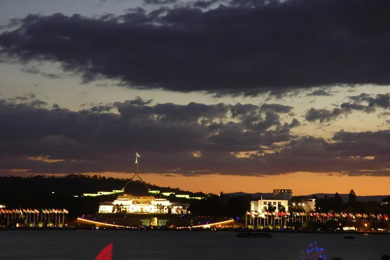 Lake Burley Griffin and Parliament House at dusk, Canberra — ACT solar and battery rebate information